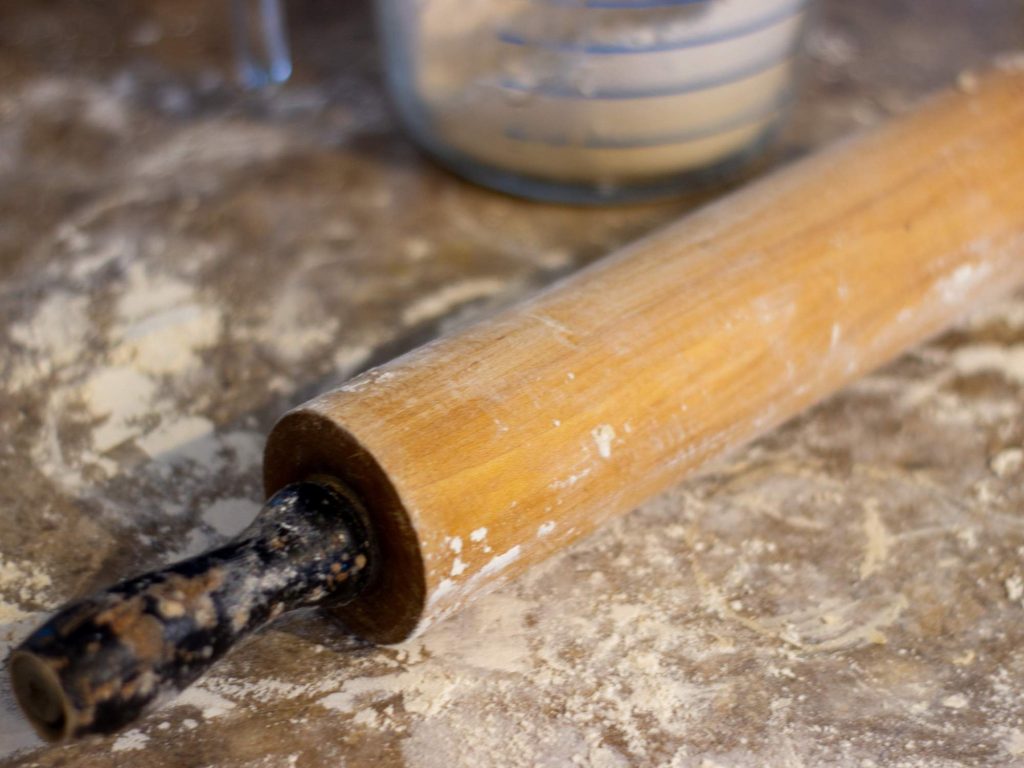 a rolling pin covered in flour