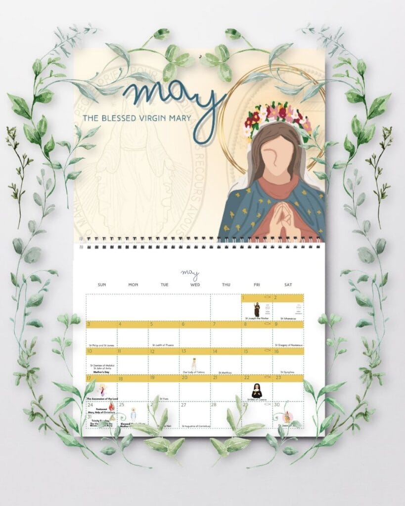 a catholic wall calendar open to May featuring Mary