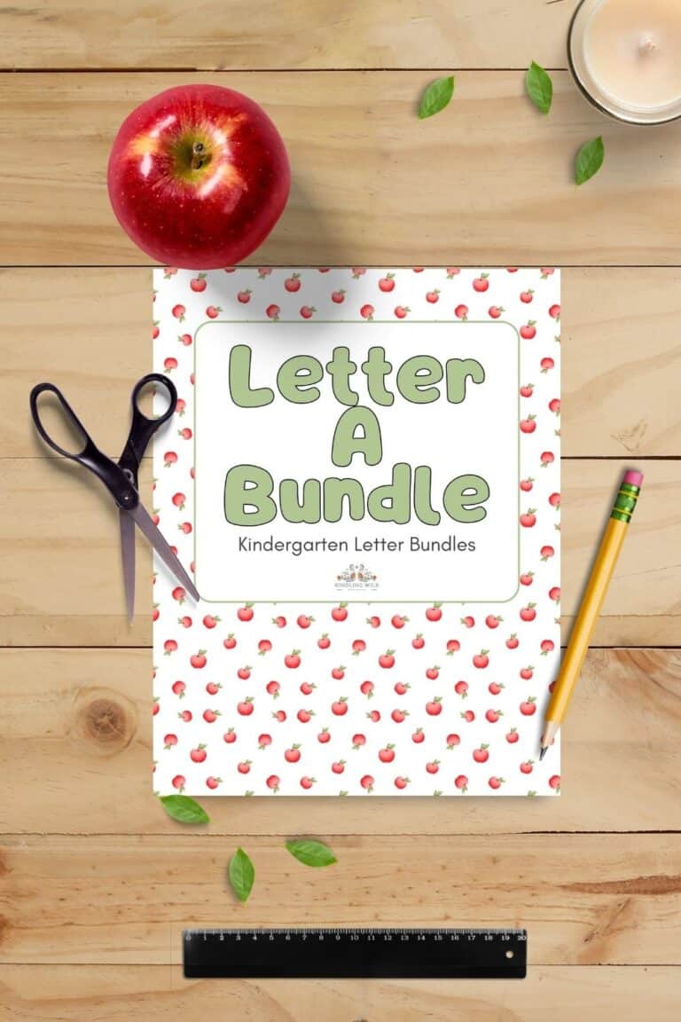 Kindergarten letter A bundle with apple and school supplies on wooden table.